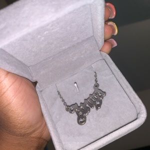 Silver “ Angel” necklace .